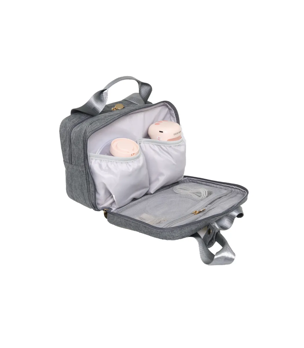 Open Leche Mum breast pump bag with wearable breast pump cups stored inside
