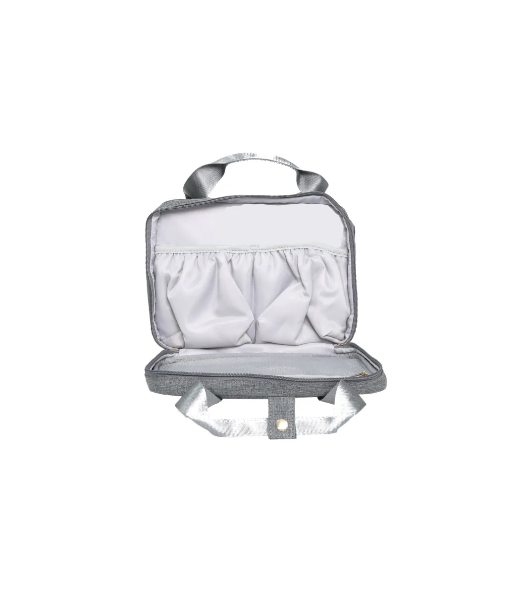 Front view of the empty open breast pump bag showing its storage compartments