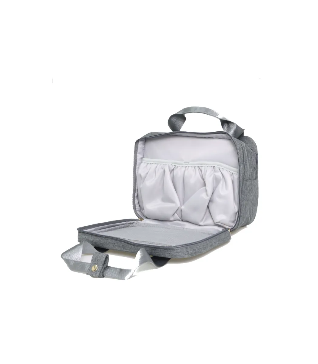 Angled view of the empty Leche Mum breast pump bag and its interior compartments